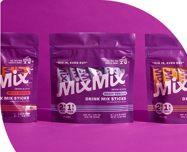Three packages of Mixmix drink mix sticks on a purple background