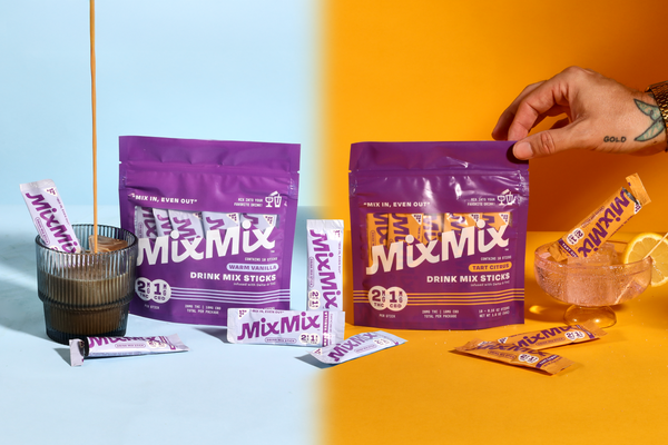 MixMix drink mix packaging and sticks on a colorful background