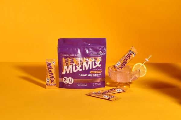 MixMix drink mix sticks packaging on a yellow background
