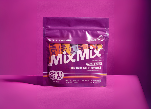 Pack of MixMix drink mix sticks on a purple background